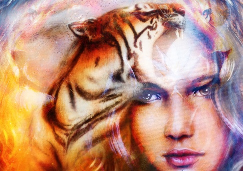 painting mighty tiger and lion head on ornamental background and mystic woman face, computer collage.